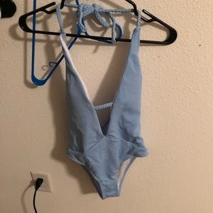 Cute low neck cut or back swim suit never worn
